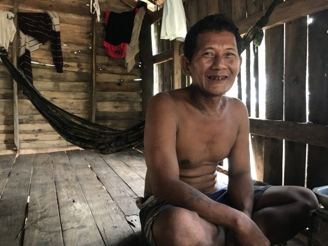 U Saw Mu Lei in his home in Myanmar's Amar Township