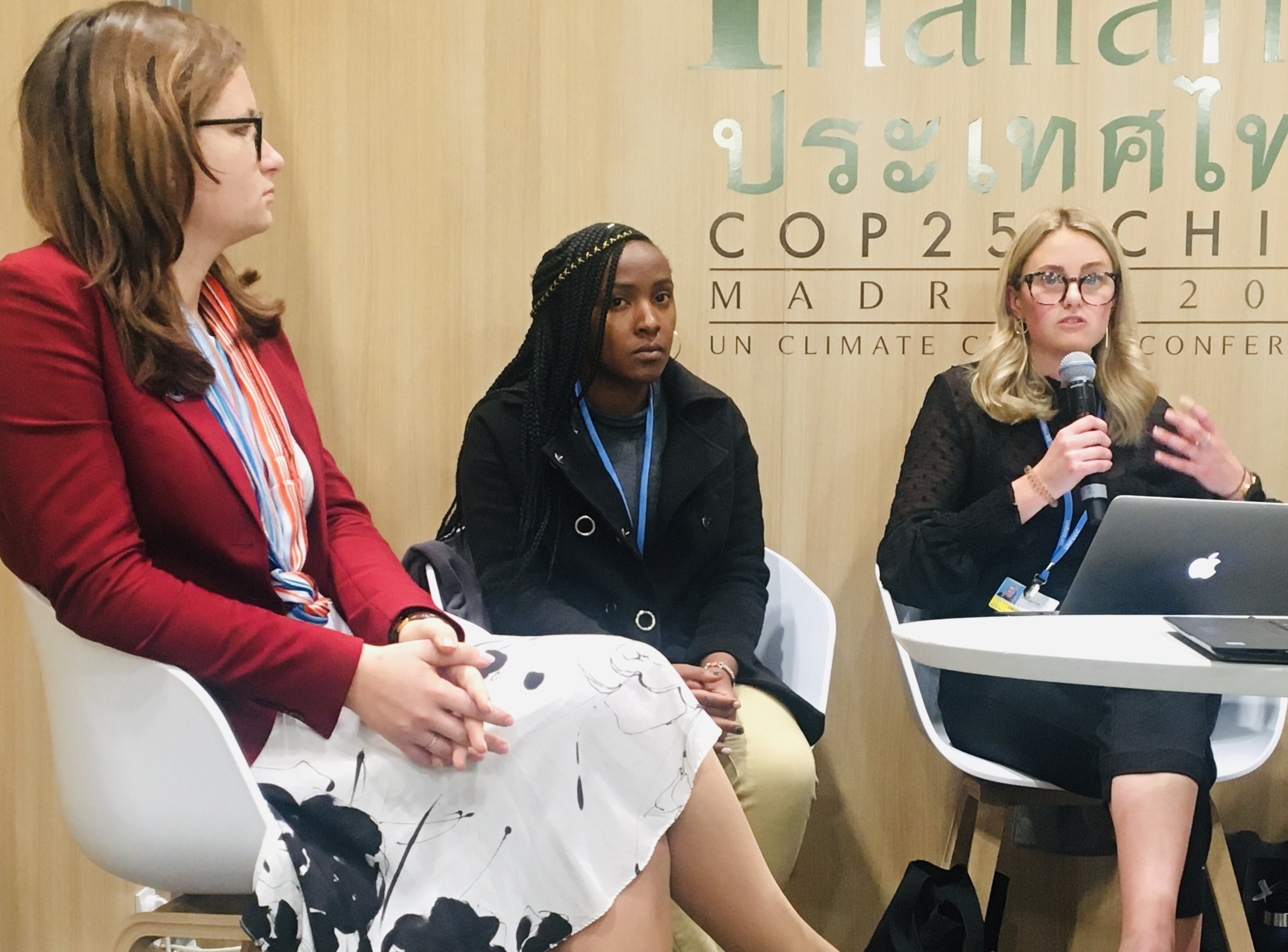 Kenyan environmentalist Elizabeth Wanjiru and other delegates speak at a panel discussion at COP25 in Madrid, Spain.