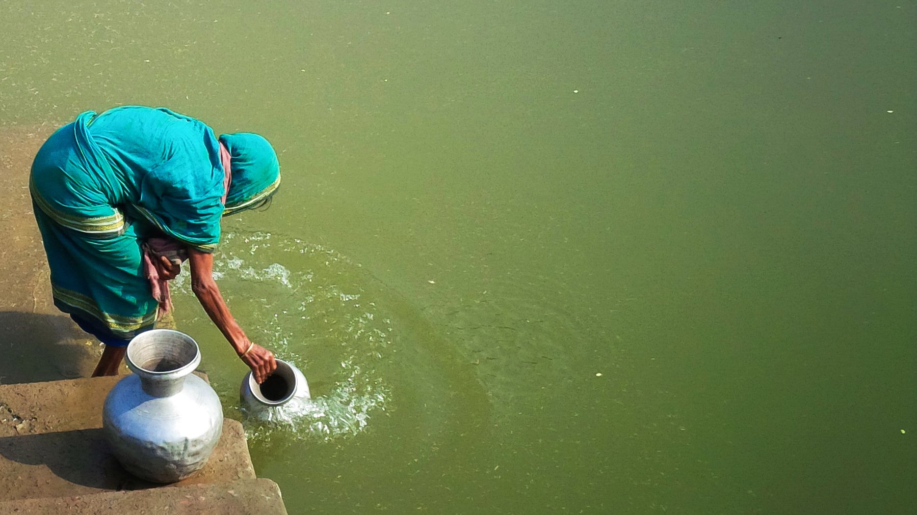 A woman collecting water in Bangladesh