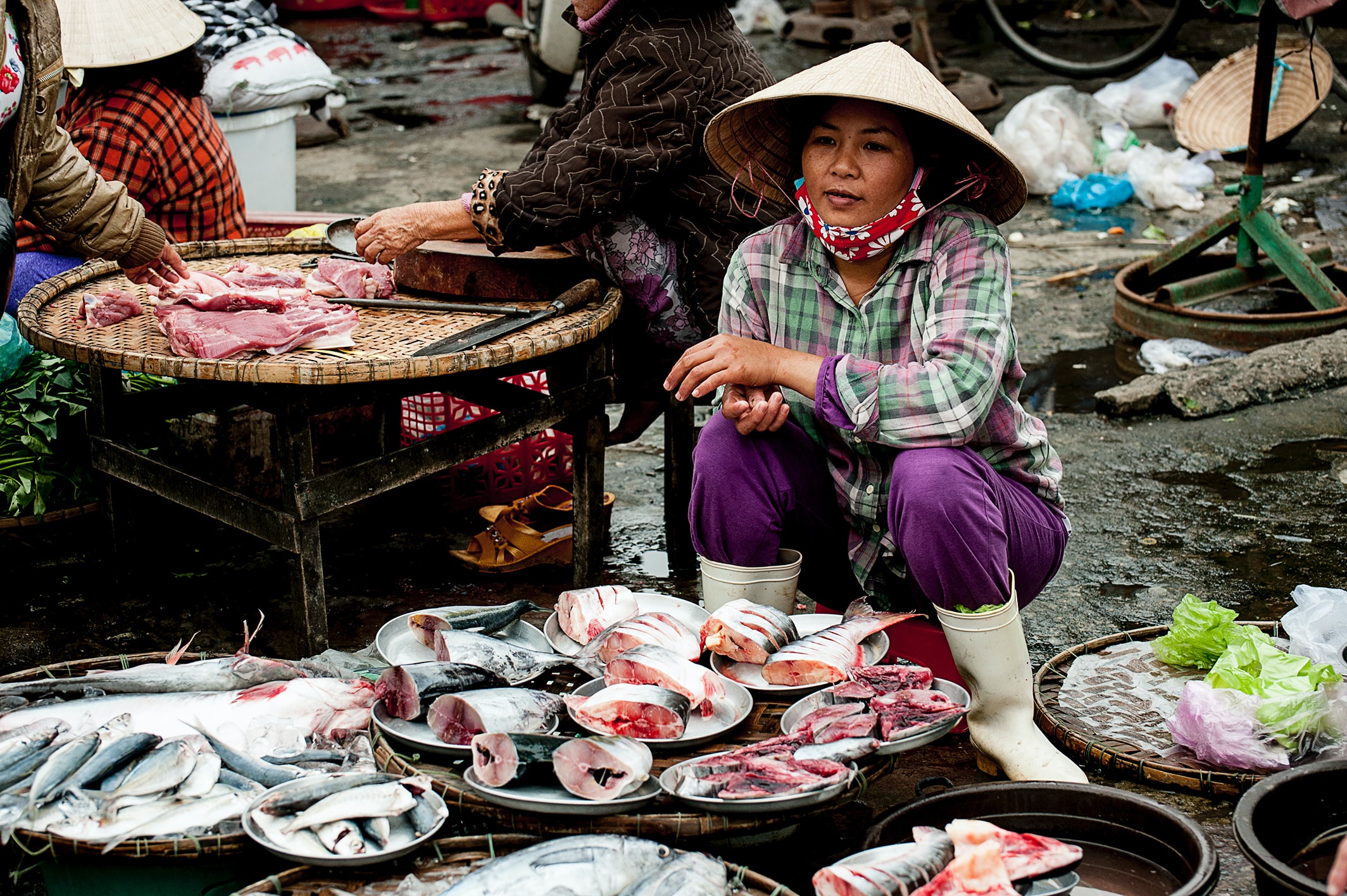 Woman selling fish at a market