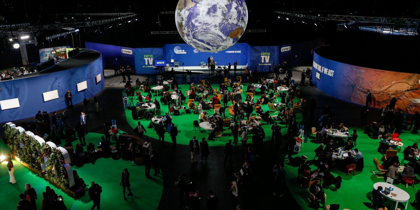 Participants gather at the COP26 climate change conference in Glasgow, Scotland. WWF finance lead, Margaret Kuhlow, believes the nature of conversations on climate finance has changed notably since COP25 in 2019.