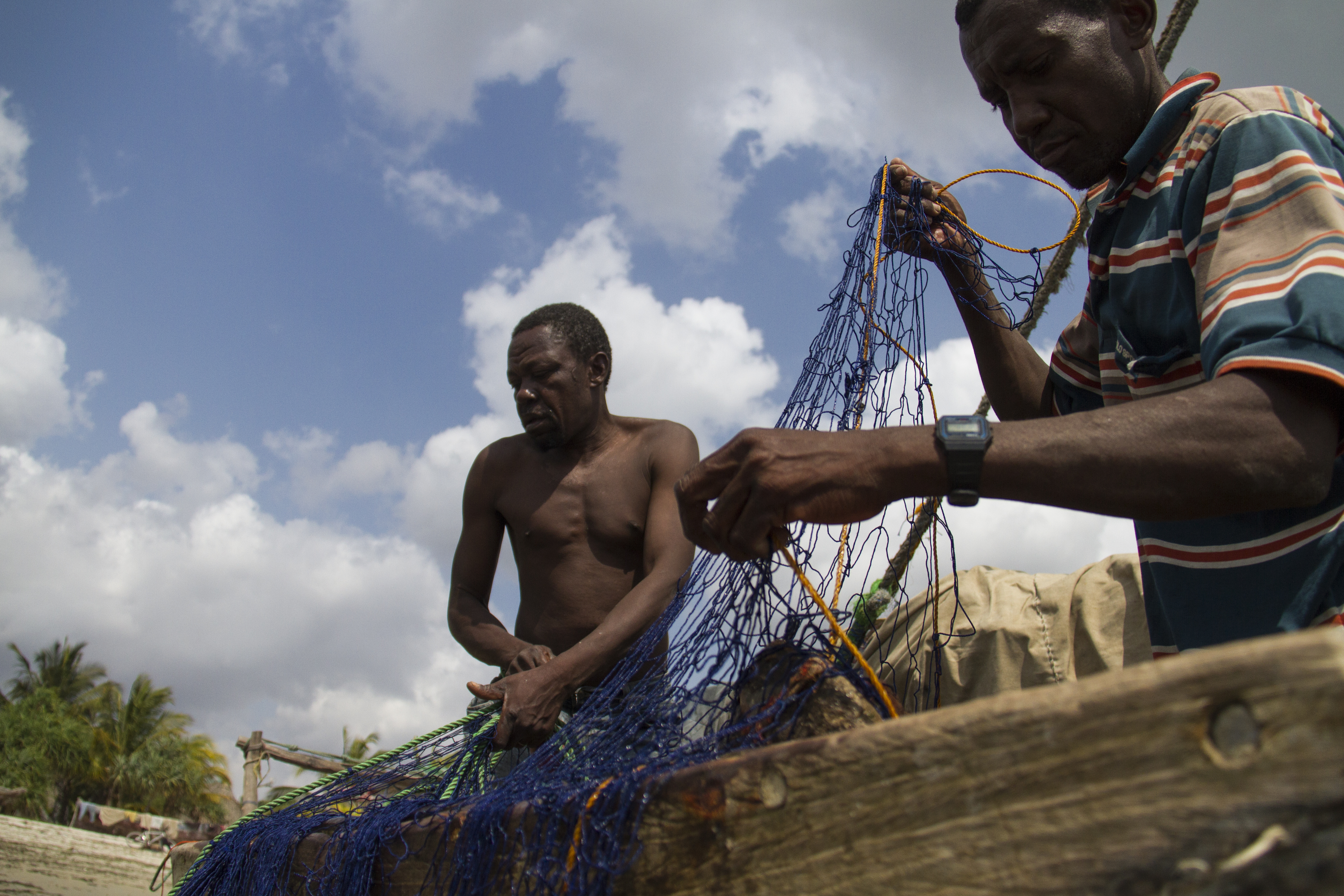 fishers mending nets
