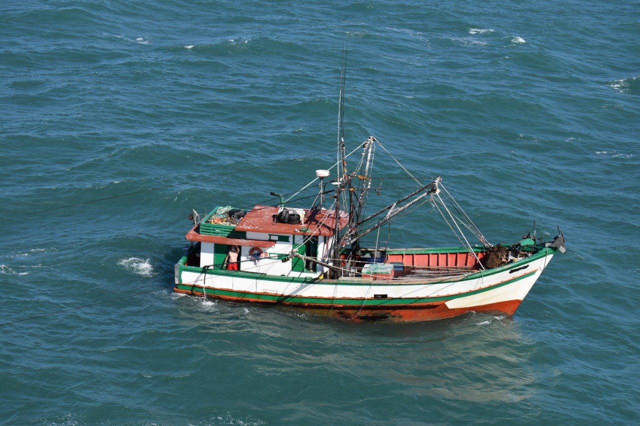 A trawler out at sea.