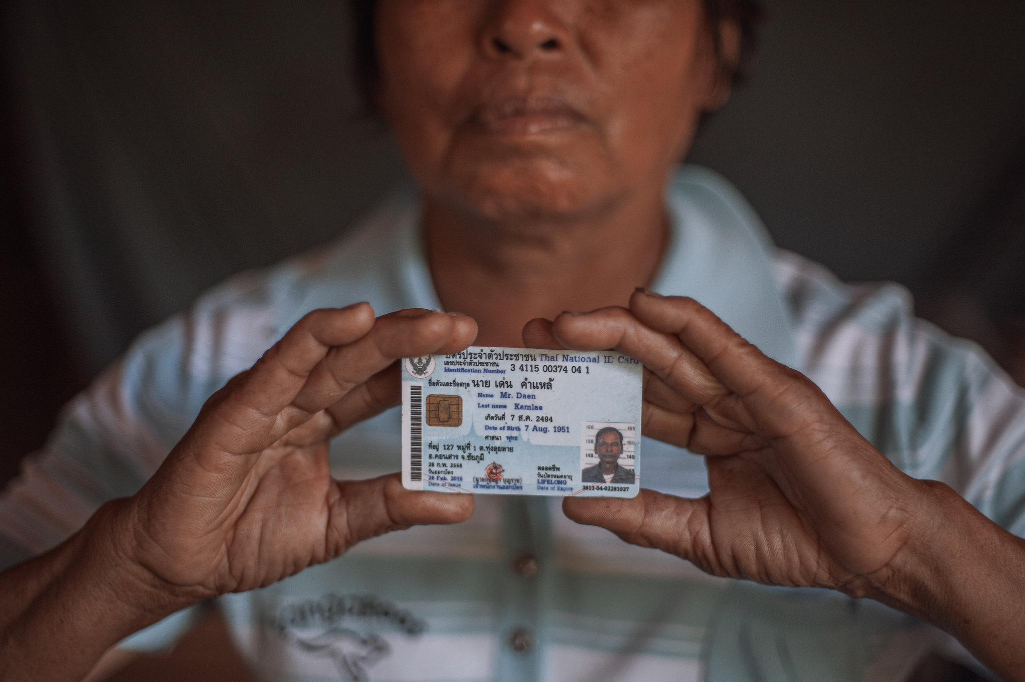 A man showing his identity card