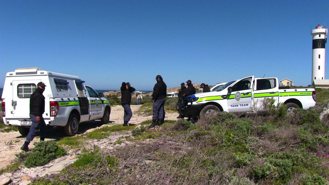 fisheries patrol with vehicles on the beach