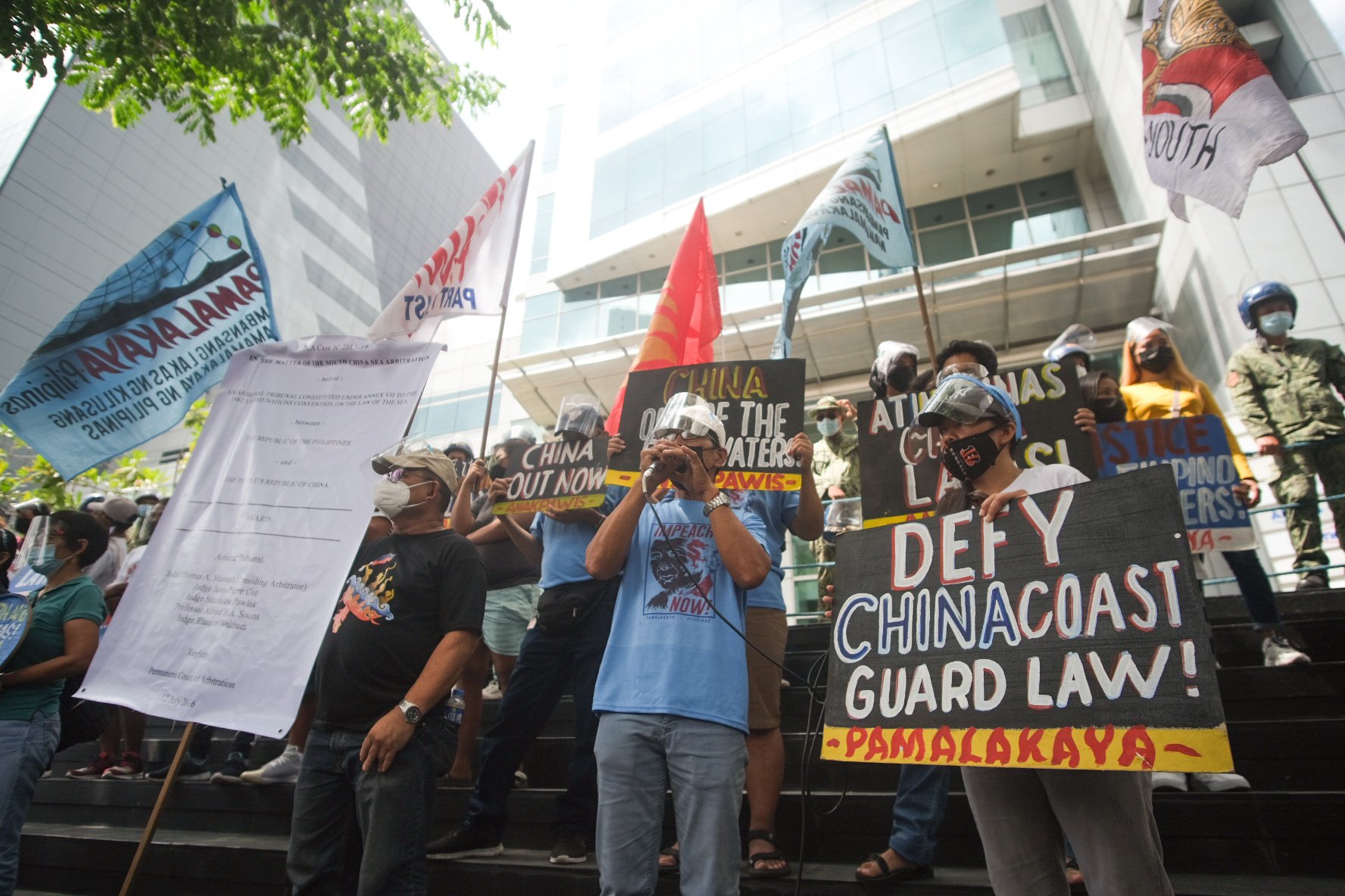 Bobby Roldan giving a speech on the 5th year of the arbitral ruling on the West Philippine Sea in front of the Chinese Embassy in Makati City, Philippines, July 12, 2021. Fisherfolk protested China’s continuing aggression in Philippine waters.