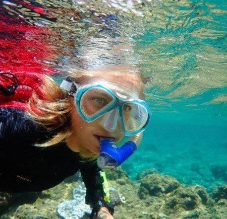 woman scuba diving underwater