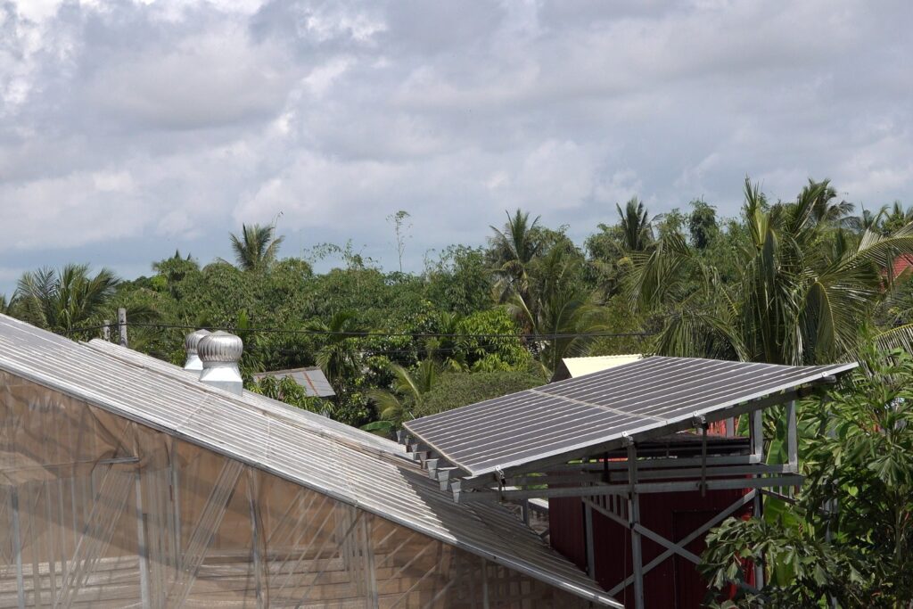 Solar panel on top a greenhouse roof