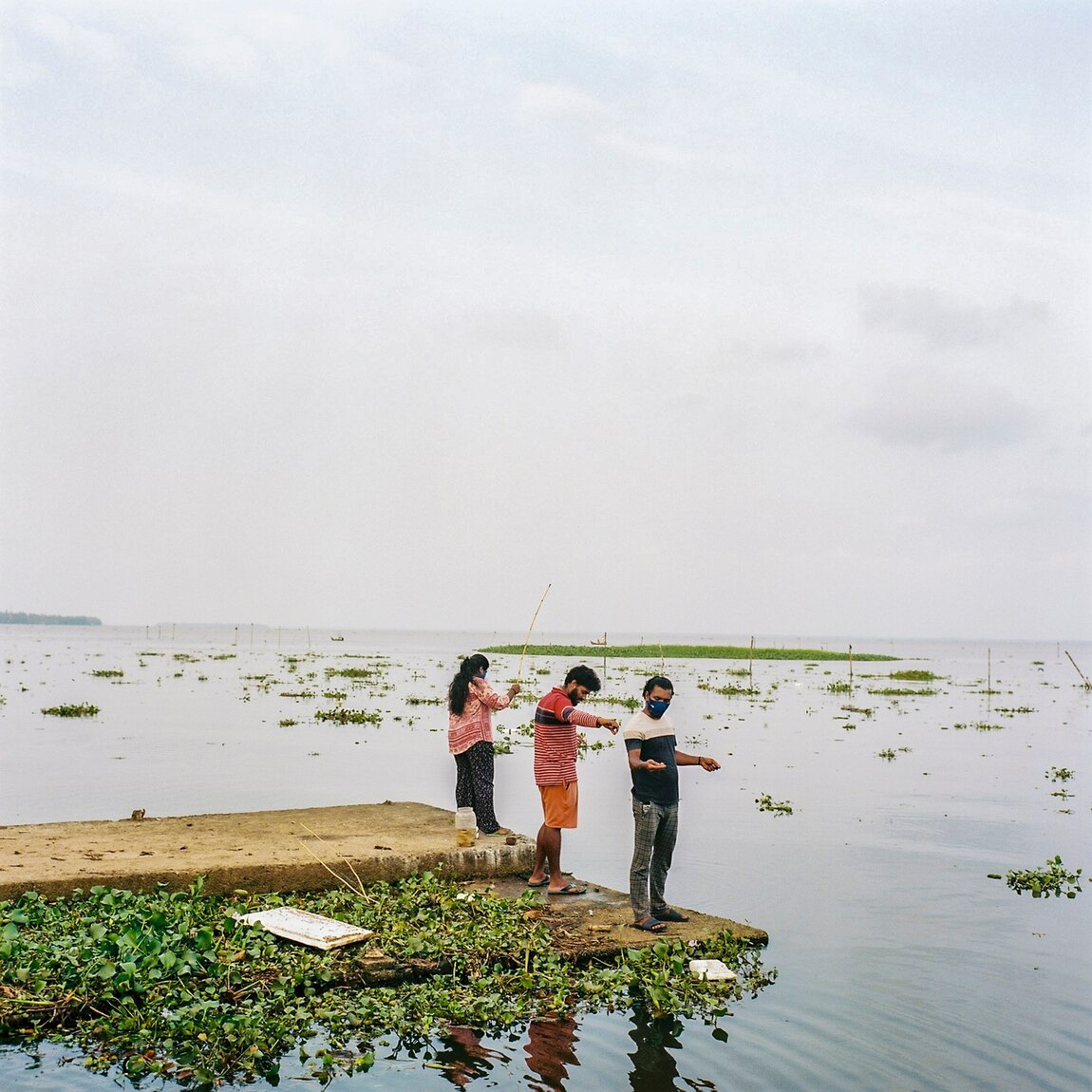 Both recreational and professional fishermen cast lines and nets in Lake Vembanad. The lake has seen a 40 percent drop in its fish population in recent years due to pollution and climate change.