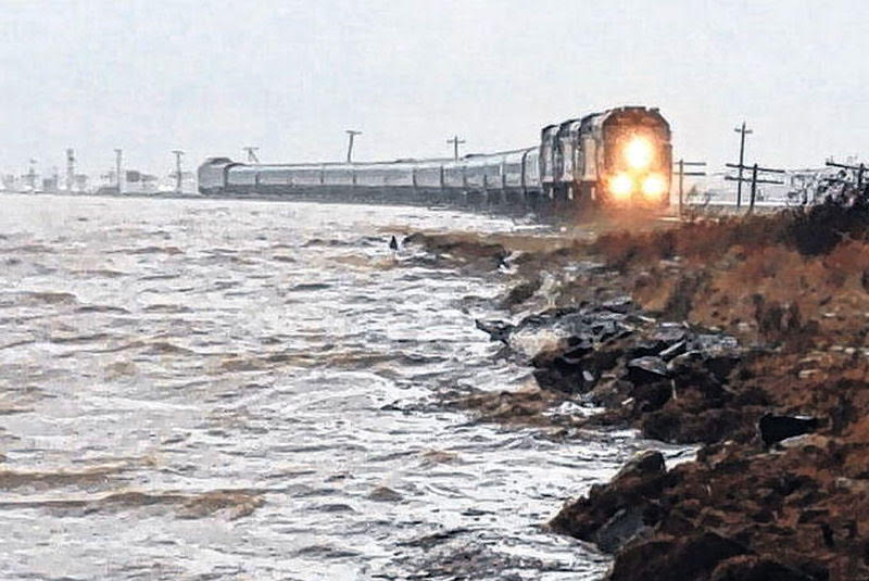 During a tidal surge in late 2015, water lapped at the edges of the train tracks on the Chignecto Isthmus [Courtesy Mike Johnson]