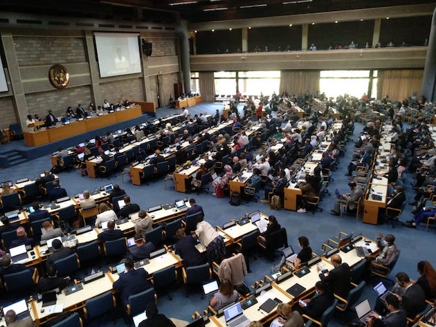 Delegates in a conference hall at the United Nations in Nairobi. 