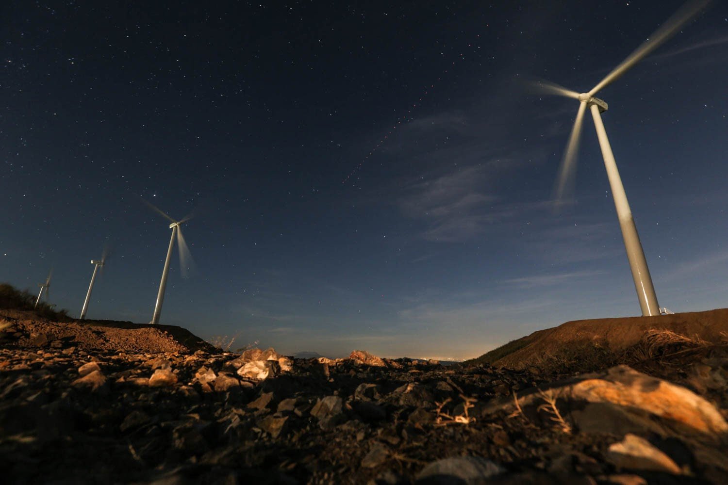 wind turbines at night