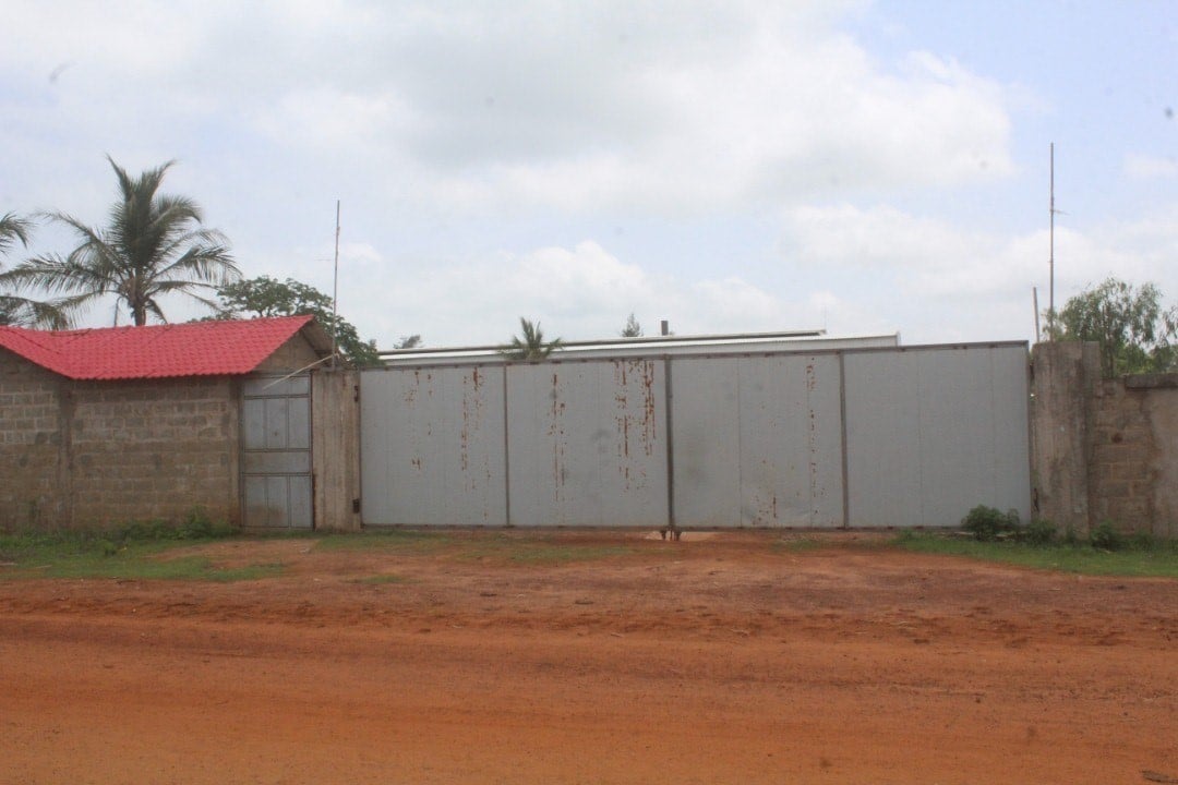 a closed factory gate