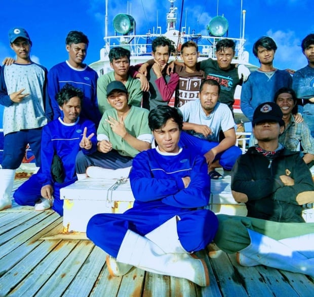 The Indonesian crew of the vessel. Sepri (middle top row, red-sleeved top) and Alfatah (second from right, top row) died at sea, and their bodies were thrown overboard against the wishes of the crew / Credit: The Guardian.