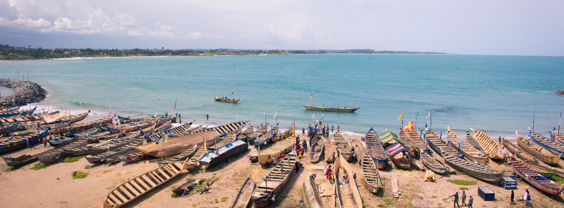 fishing boats on the coast in Cape Coast, Ghana