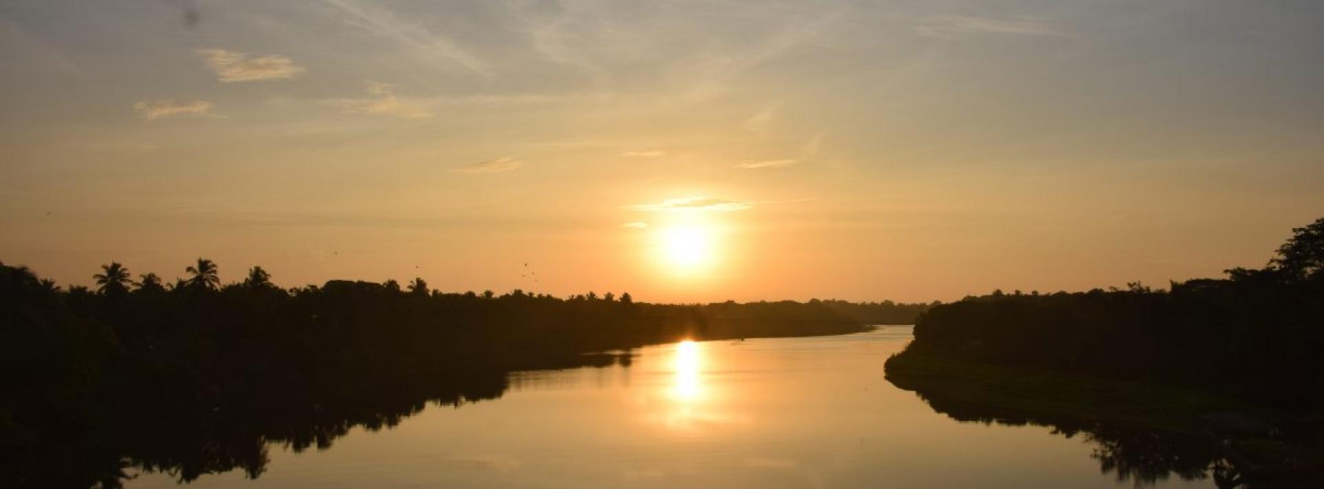 sunset over a wide river