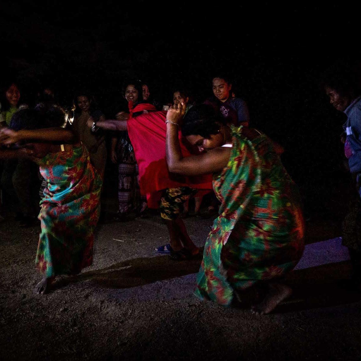 Aeta women perform a traditional dance during a gathering in December 2019, in Sitio Sapang Kawayan, Capas, Tarlac. Their dance mimics the movement of animals. The Aetas perform their dances for entertainment and rituals / Credit: Bernice Beltran