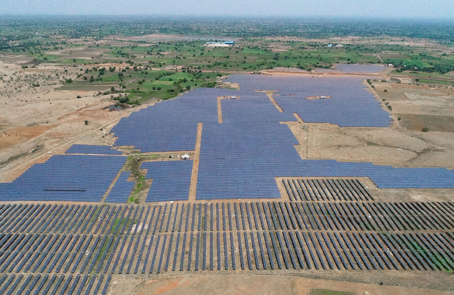 an aerial view of a solar park 