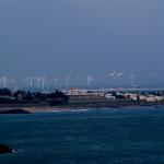 windmills on the shoreline
