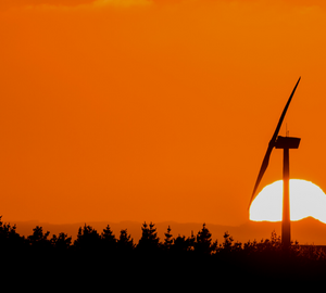 wind turbine at sunset.