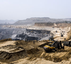 excavators at an open coal mine