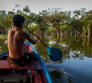 A traditional fishermen in an Indigenous territory on the Tapajós River, in the Brazilian Amazon. Photo credit: Marcio Isensee e Sá. Licensed via Adobe Photo Stock