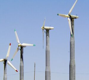 Windmills against a blue sky backdrop 