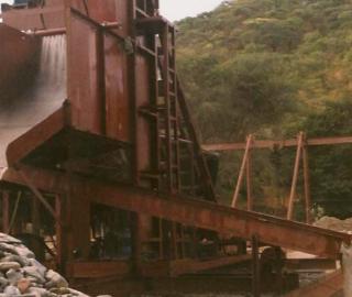 Mining machine in the Lupa River