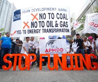 Climate activists protest infront of the Asian Development Bank headquarters in Manila to stop funding coal power plants.