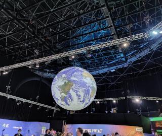 Action zone at the COP26 venue in Glasgow, Scotland where this rotating globe reminds delegates of what they are trying to save (Photo: Disha Shetty)