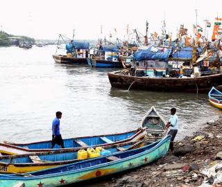 Fishermen anchored their boats at Versova beach in Mumbai ahead of Cyclone Tauktae, in the Arabian Sea, Mumbai, May 15, 2021. Photo: PTI