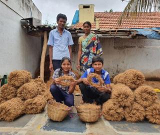 a family outside with coir rope