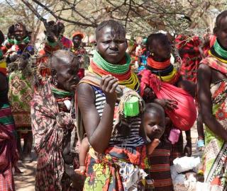 Members of the public wait for their rations of relief food distribution by President William Ruto to hunger victims due to prolonged drought, at Nakaalei in Turkana on November 5, 2022.  Jared Nyataya | Nation Media Group