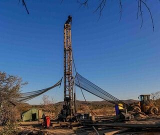 A coal exploration exercise featuring heavy machinery in Zimbabwe